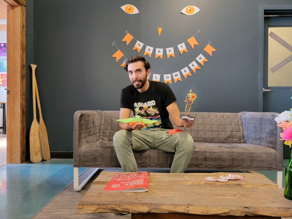 Jon posing with pumpkin and trophy