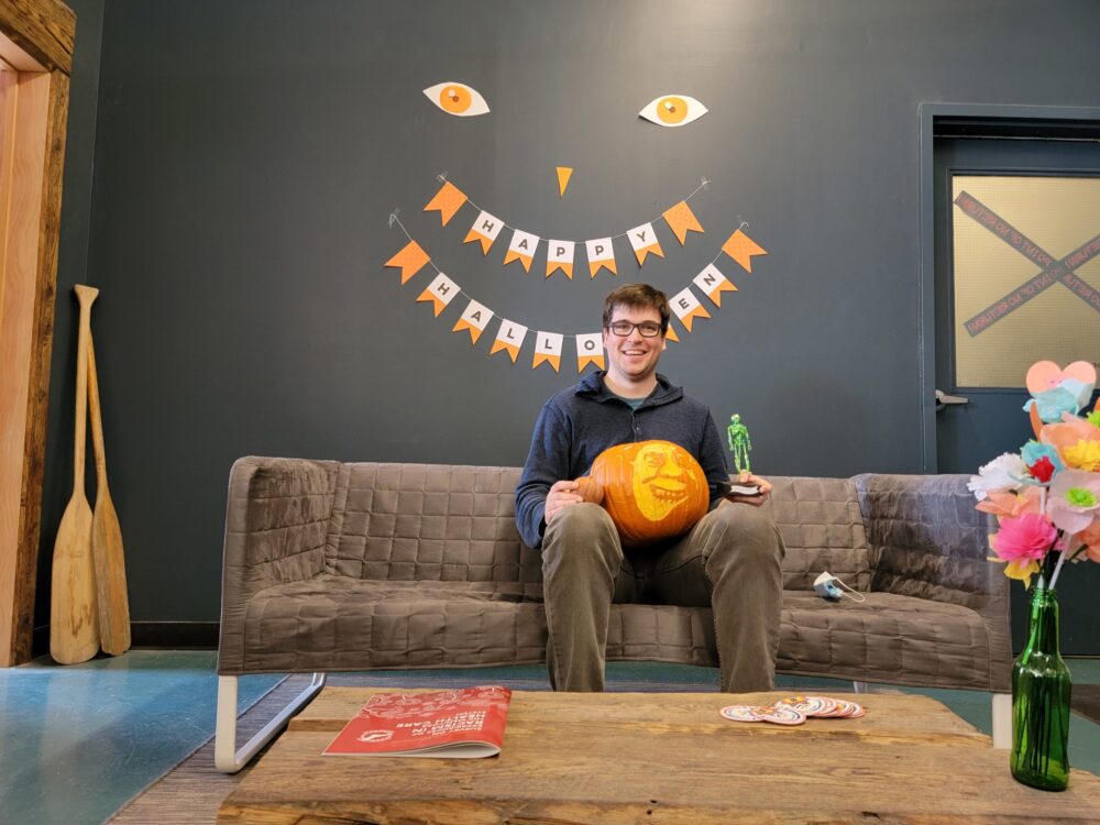 Will posing with pumpkin and trophy