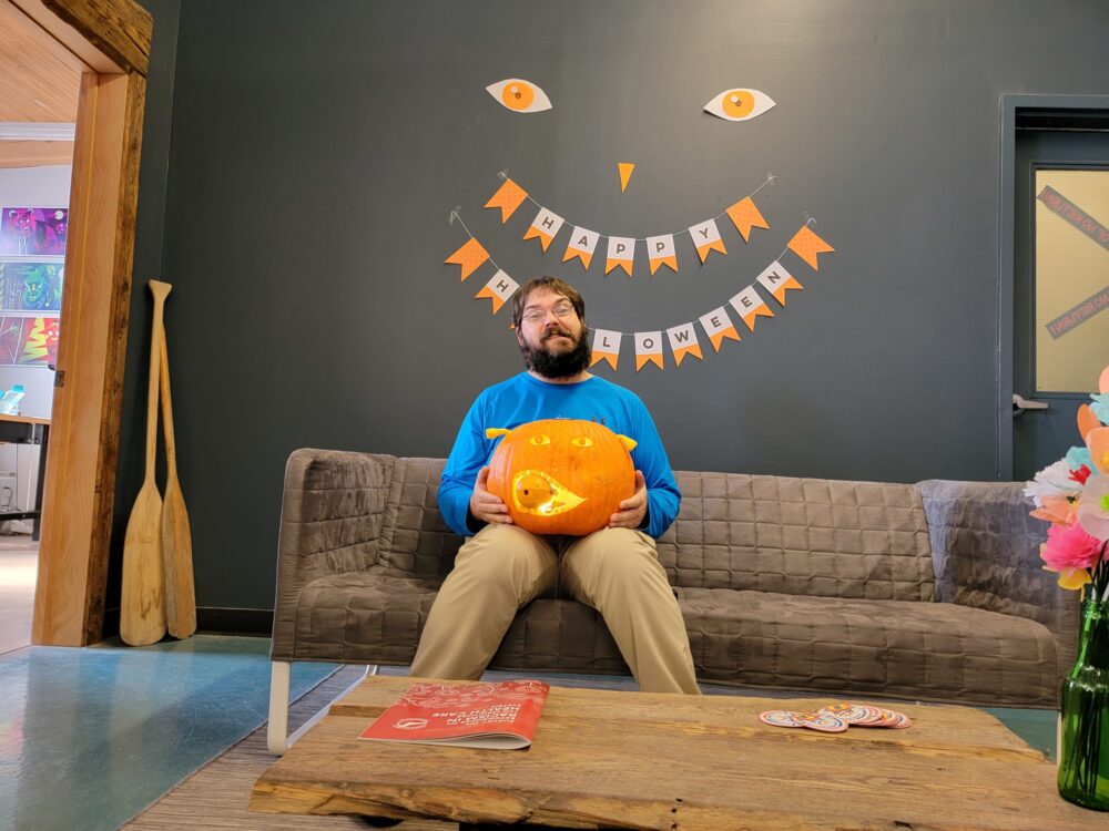 Dean posing with pumpkin