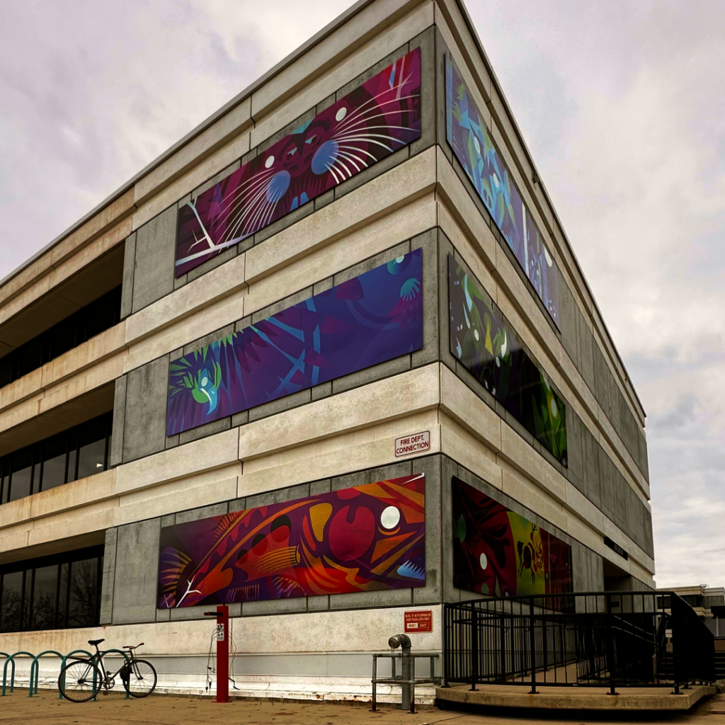 Red River College Polytechnic campus building featuring a set of six Indigenous murals.
